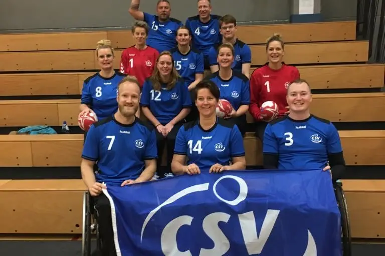 Teamfoto van het rolstoelhandbalteam in België